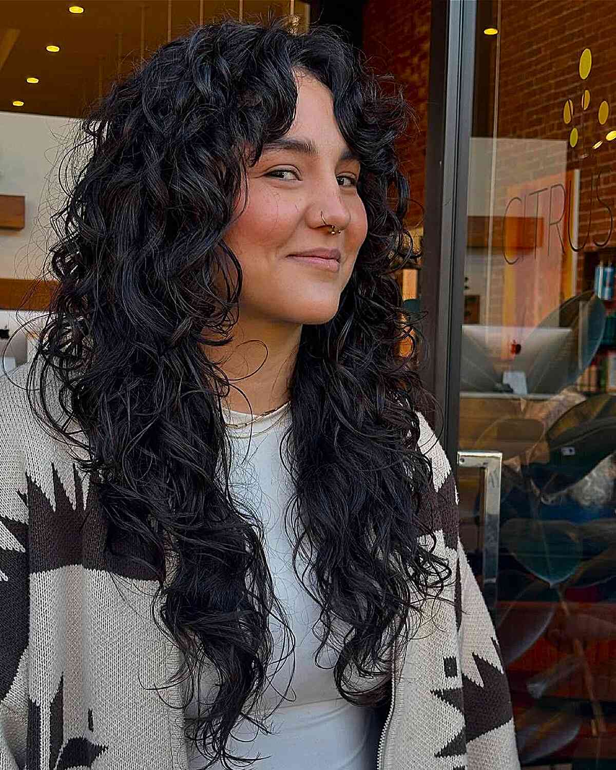 Collarbone Shag With Face-Framing Layers — Simple Curly Shag