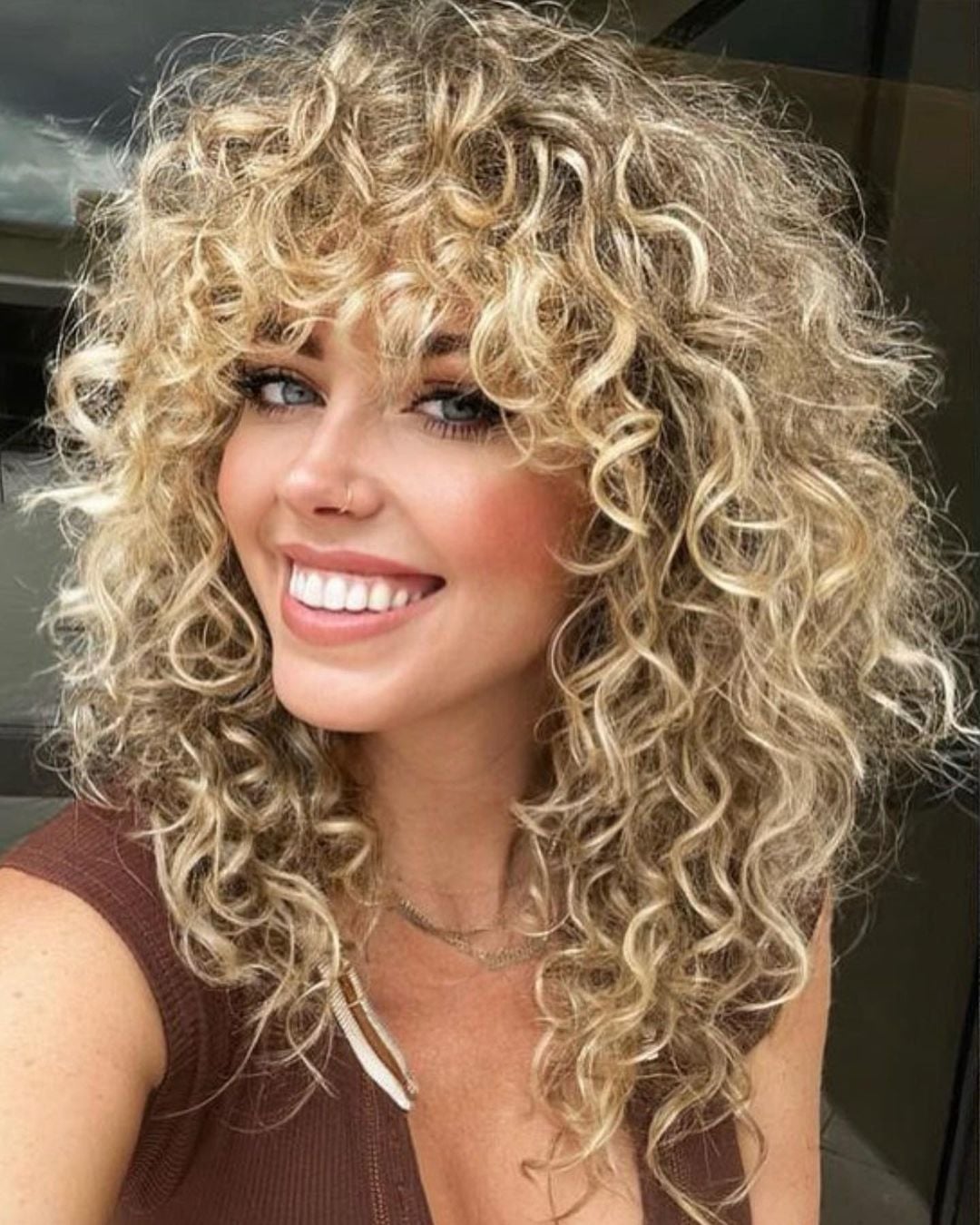 Blonde Collarbone Shag With Blowout — Simple Curly Shag