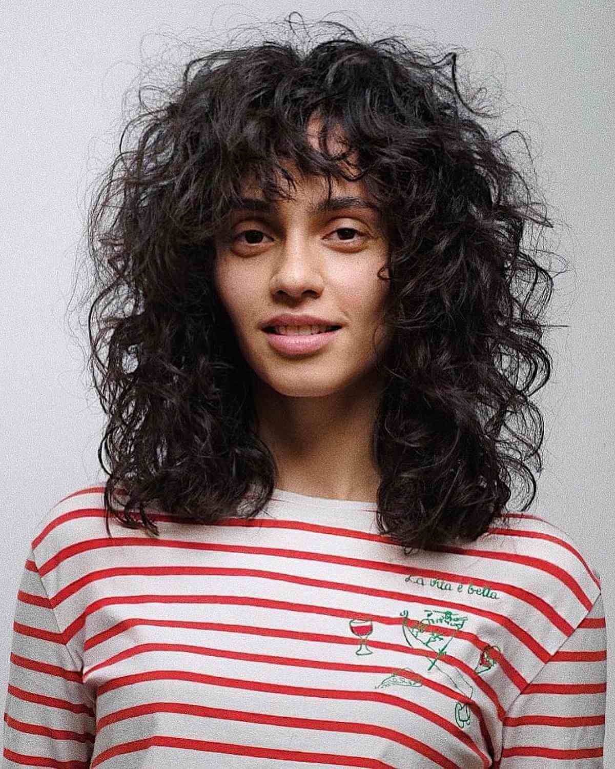 Mid-Back Shag With Choppy Bangs — Simple Curly Shag