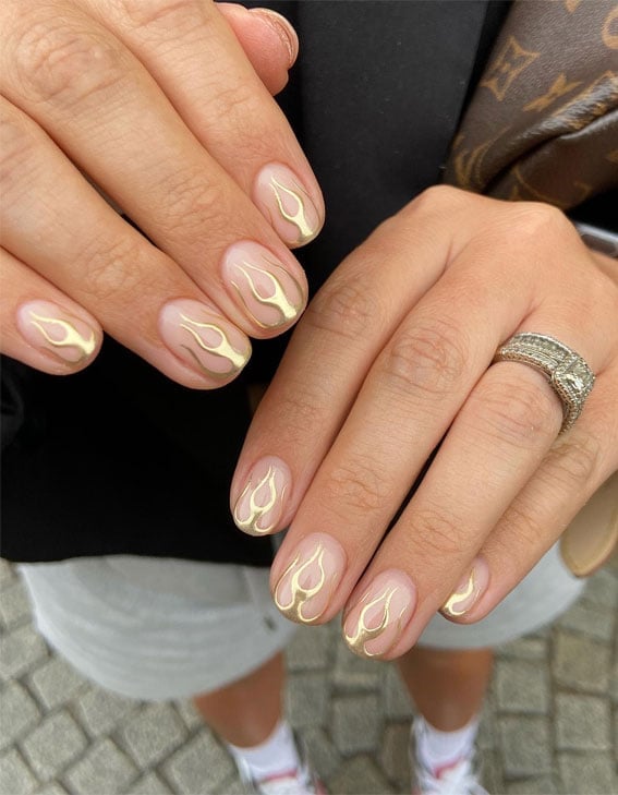 Short Oval Nude Gold Flame Outline Short Oval Nude Gold Flame Outline — Simple Gold Chrome Nails