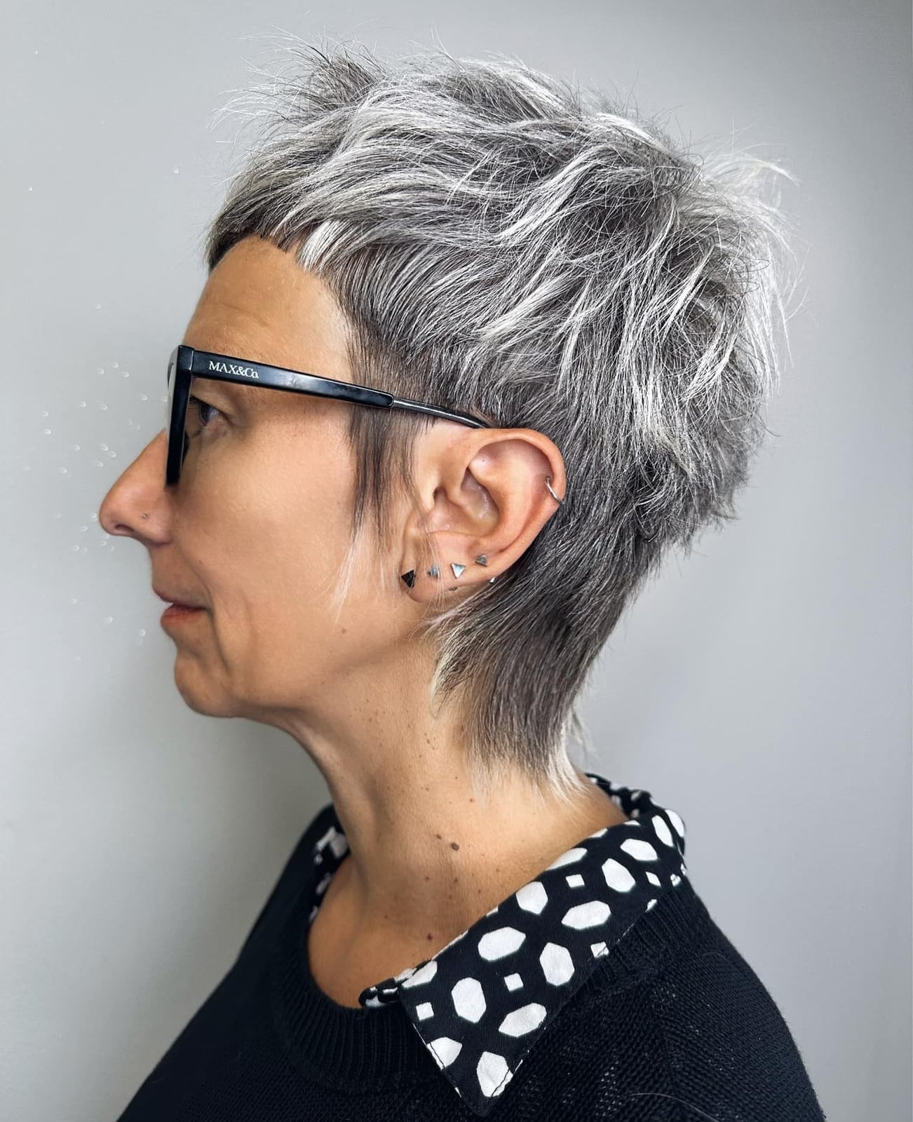 Short Textured Pixie With Gray Highlights Short Textured Pixie With Gray Highlights — Simple Gray Blending