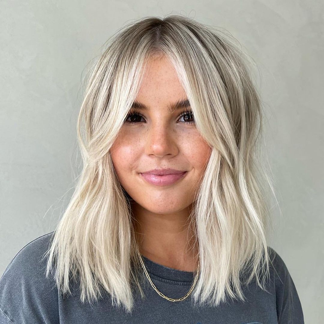 Collarbone Shag With Curtain Bangs Collarbone Shag With Curtain Bangs — Simple Haircuts for Thinning Hair