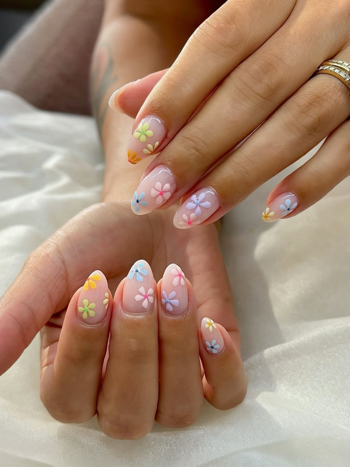 Medium Almond Sheer Nude With Small Pastel Flowers — Simple Japan Nails