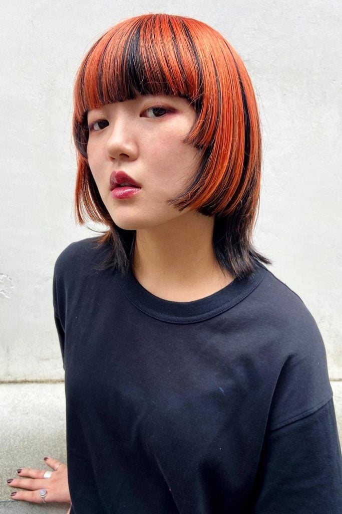 Orange Blunt Bob With Black Lowlights Orange Blunt Bob With Black Lowlights — Simple Jellyfish Haircut