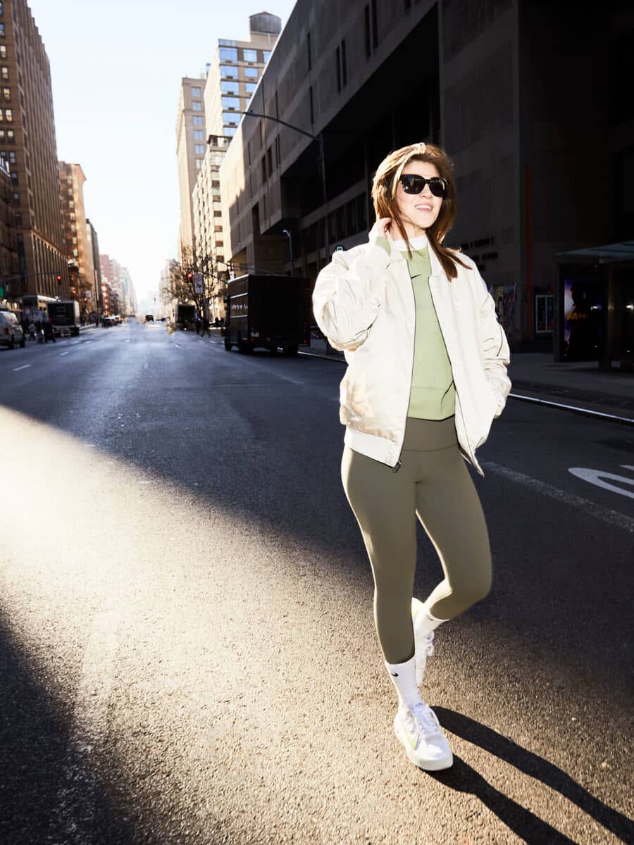 Cream Bomber Jacket With Green Leggings and White Sneakers Cream Bomber Jacket With Green Leggings and White Sneakers — Simple Jordans Outfits