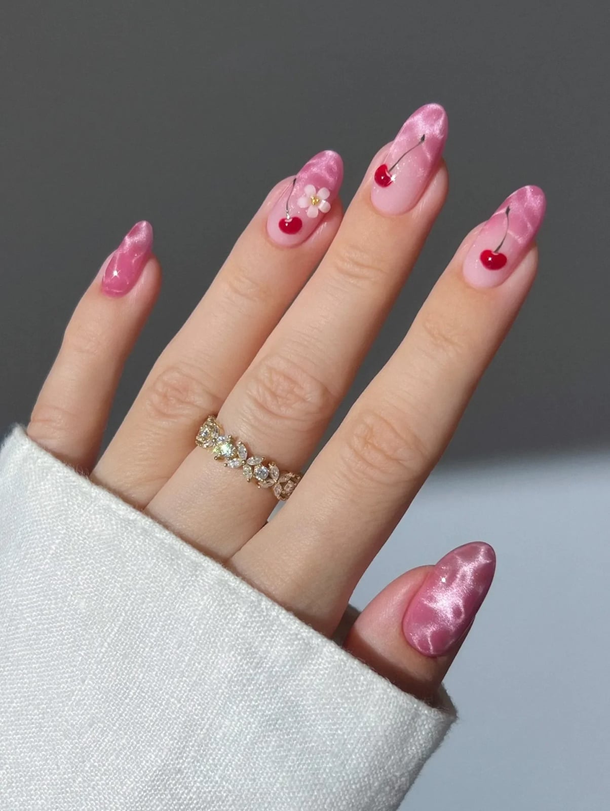 Medium Almond Cat-Eye Pink with Flower and Cherry Accents — Simple Kawaii Nails