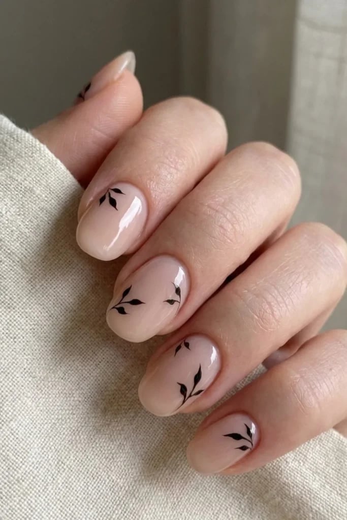 Short Oval Nails With Delicate Black Leaf Motifs — Simple Minimalist Nails