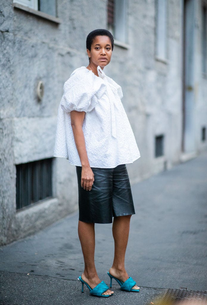White Puff-Sleeve Top with Leather Shorts, Office-Safe Version White Puff-Sleeve Top with Leather Shorts, Office-Safe Version — Simple Mules Outfits