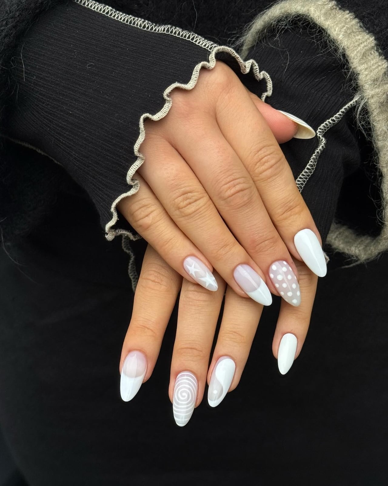 Medium Almond Nails With White Star, Dots, and Spiral Medium Almond Nails With White Star, Dots, and Spiral — Simple Nail Art Inspo