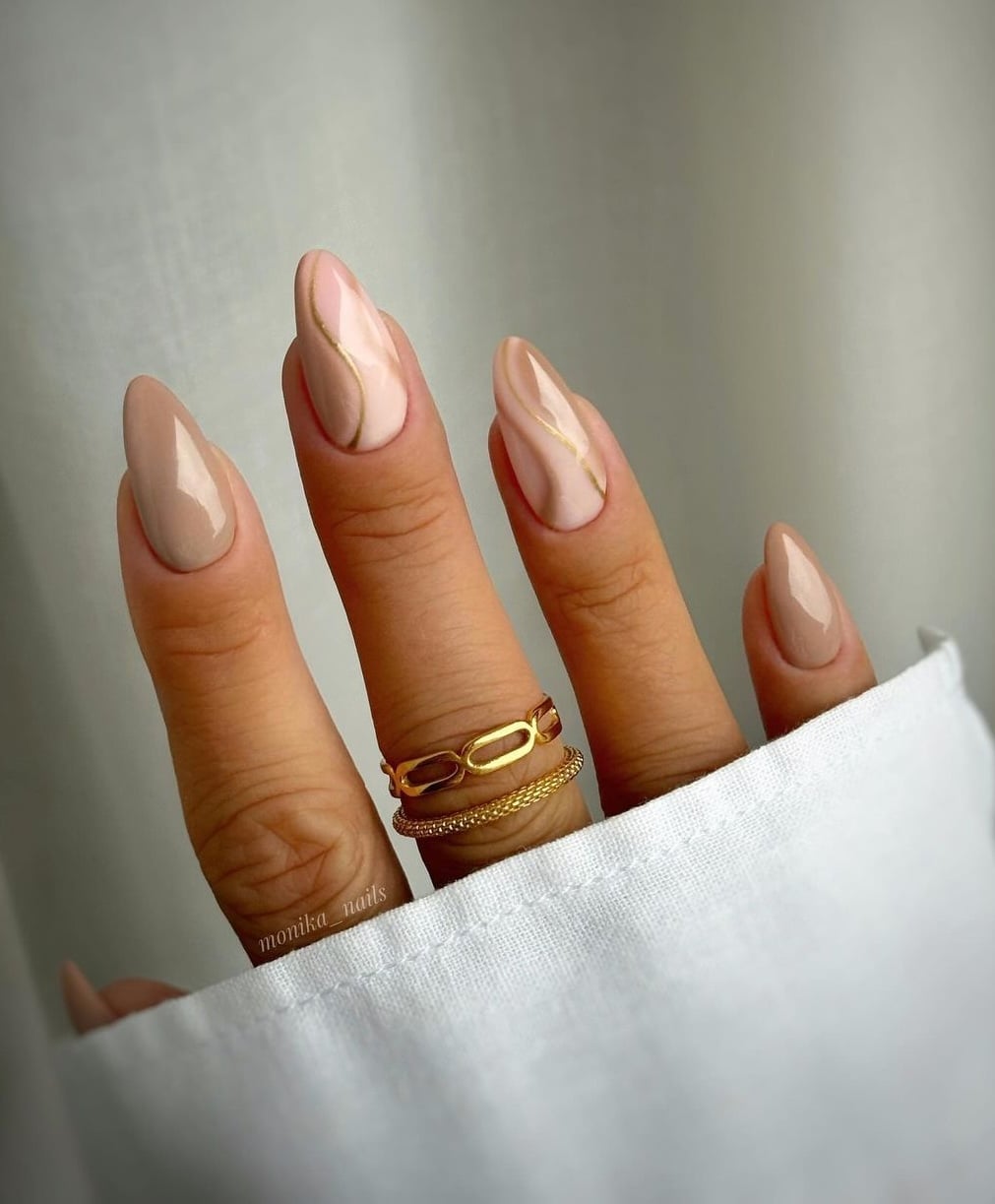 Long Almond Nails With Abstract Gold Lines Long Almond Nails With Abstract Gold Lines — Simple Nail Art Inspo