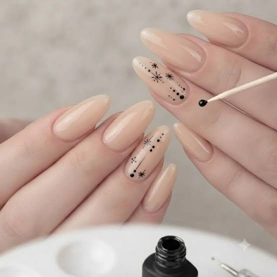 Medium Almond Nude With Black Starburst Dots Medium Almond Nude With Black Starburst Dots — Simple Nail Designs