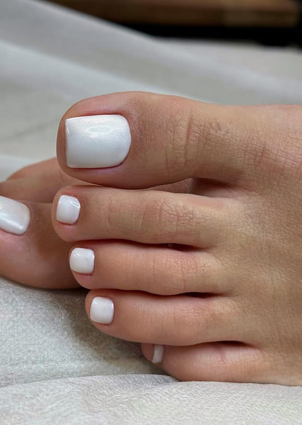 Opaque White Glossy Short Square Toenails, Close-Up Take Opaque White Glossy Short Square Toenails, Close-Up Take — Simple Pedicure Nails