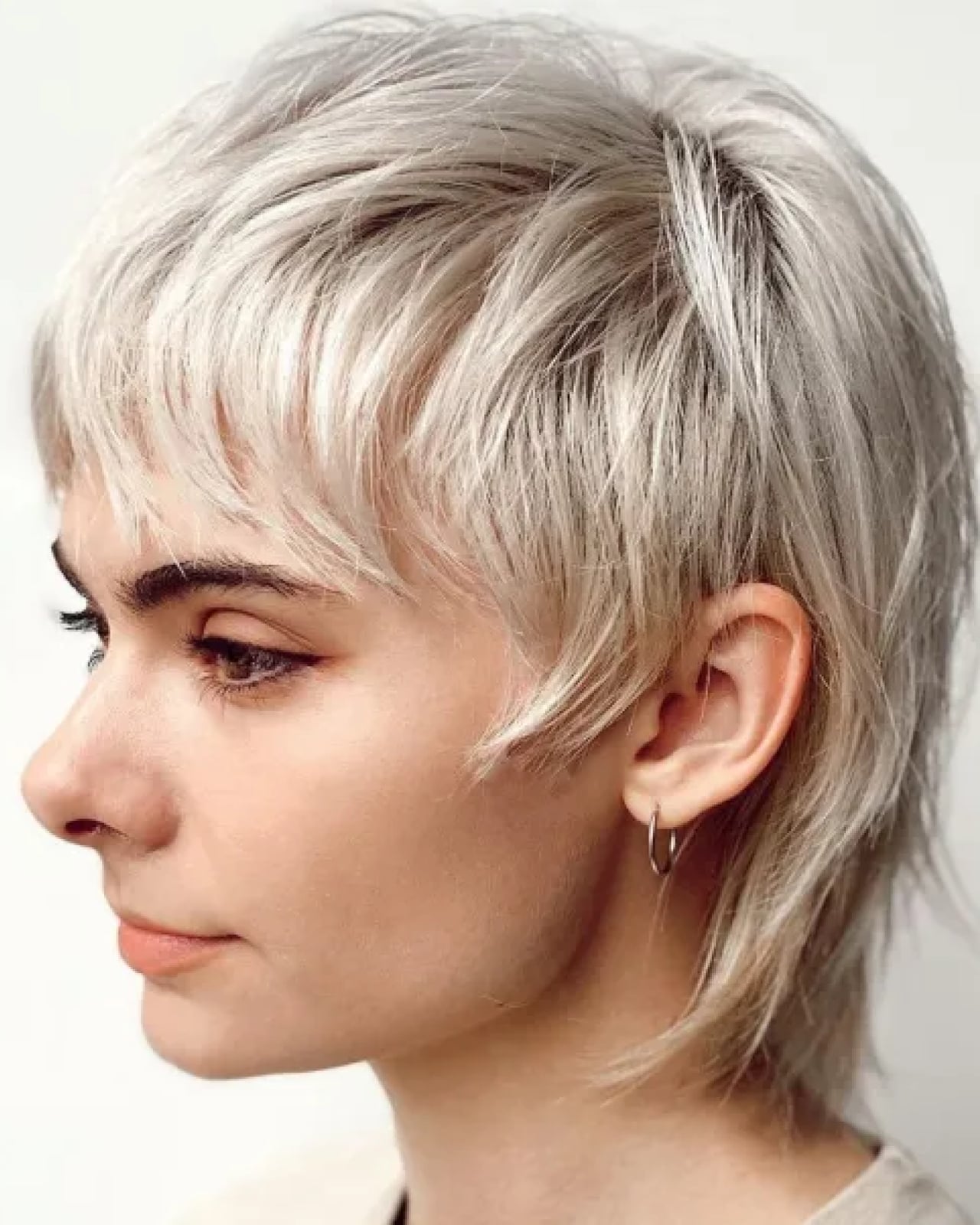 Ash Blonde Pixie With Textured Layers And Wispy Fringe — Simple Pixie Hairstyles