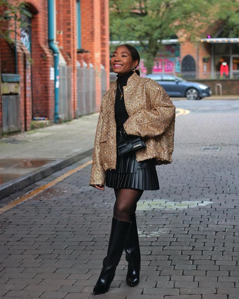 Black Pleated Mini Skirt with a Sequin Jacket, Close-Up Take — Simple Pleated Skirt Outfits