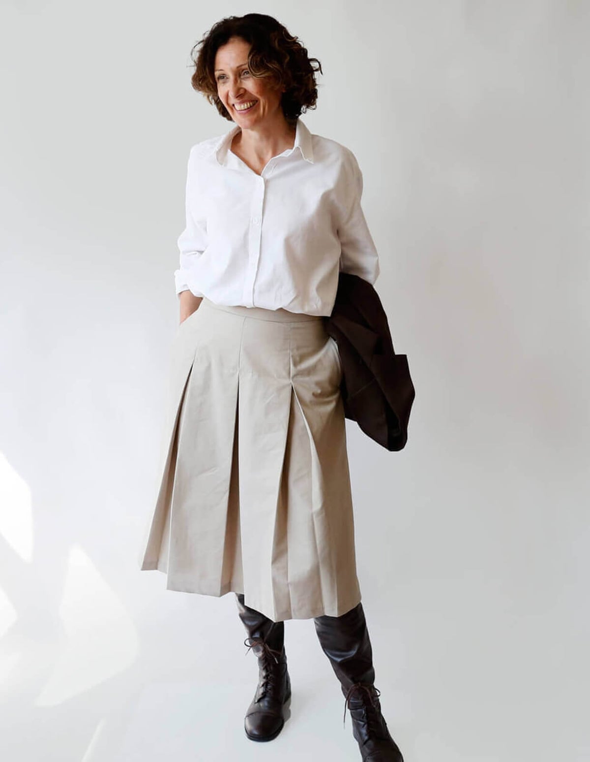 Beige Pleated Midi Skirt with a White Button-Down Shirt, Close-Up Take — Simple Pleated Skirt Outfits