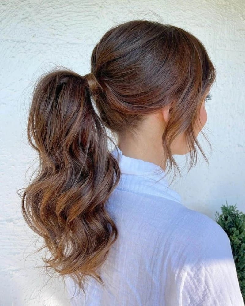 Medium Brown Wavy Ponytail With Curtain Bangs Medium Brown Wavy Ponytail With Curtain Bangs — Simple Pony Hairstyles