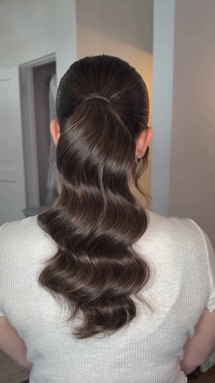 Ultra-Sleek Dark Brown Wavy Ponytail Ultra-Sleek Dark Brown Wavy Ponytail — Simple Pony Hairstyles