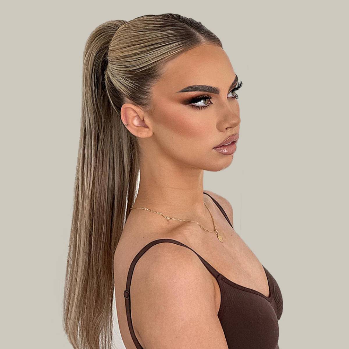 Sleek Blonde High Ponytail With Highlights Sleek Blonde High Ponytail With Highlights — Simple Pony Hairstyles