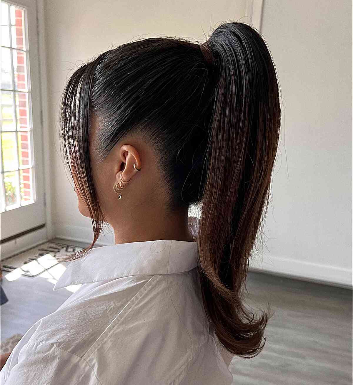 Sleek Dark Brown Ponytail With Ombre And Curtain Bangs Sleek Dark Brown Ponytail With Ombre And Curtain Bangs — Simple Pony Hairstyles