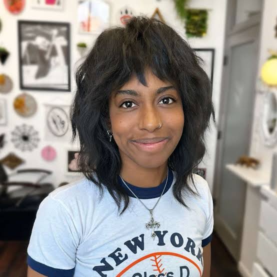 Collarbone Dark Brown Shag With Textured Layers and Curtain Bangs Collarbone Dark Brown Shag With Textured Layers and Curtain Bangs — Simple Shag Hairstyles