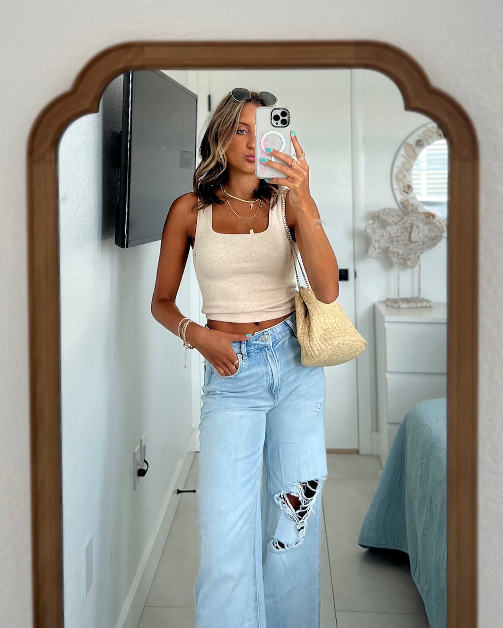 Light Blue Ripped Jeans with Beige Tank Light Blue Ripped Jeans with Beige Tank — Simple Style Inspo