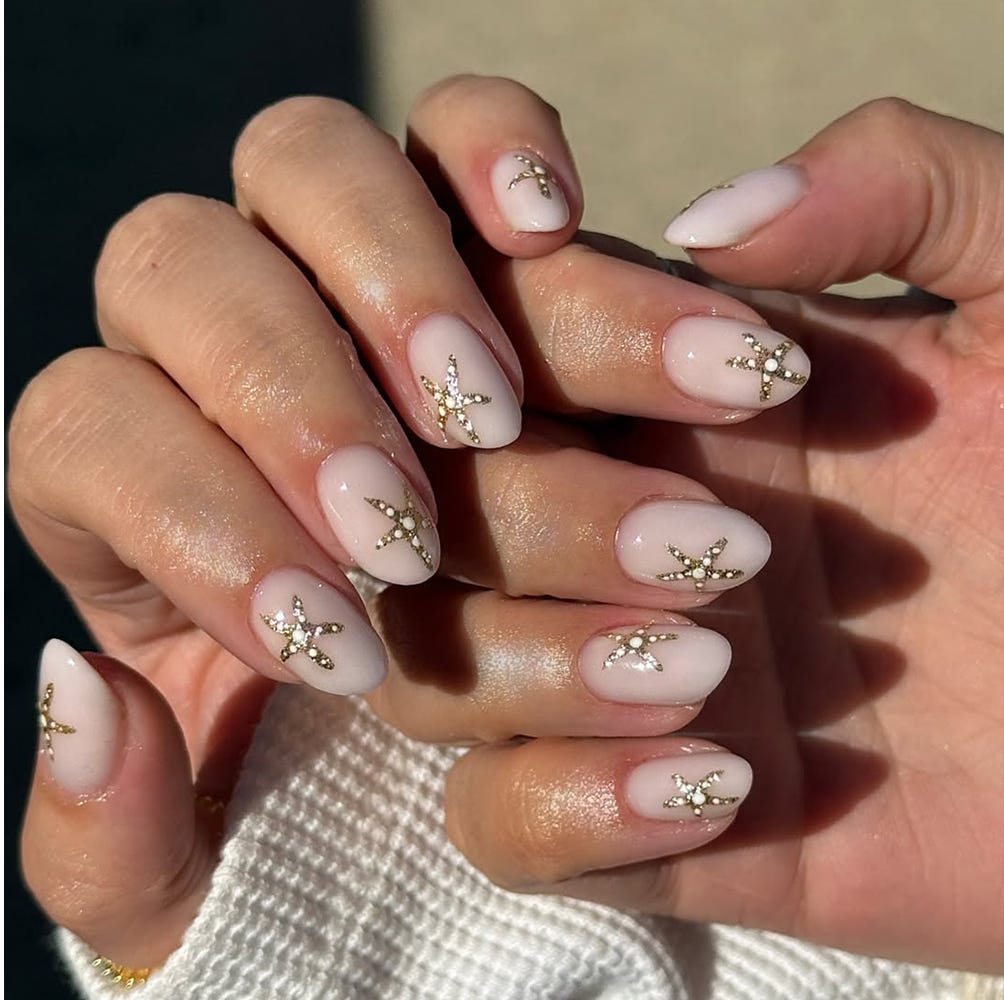 Nude Almond Nails With Gold Star Embellishments Nude Almond Nails With Gold Star Embellishments — Simple Vintage Nails