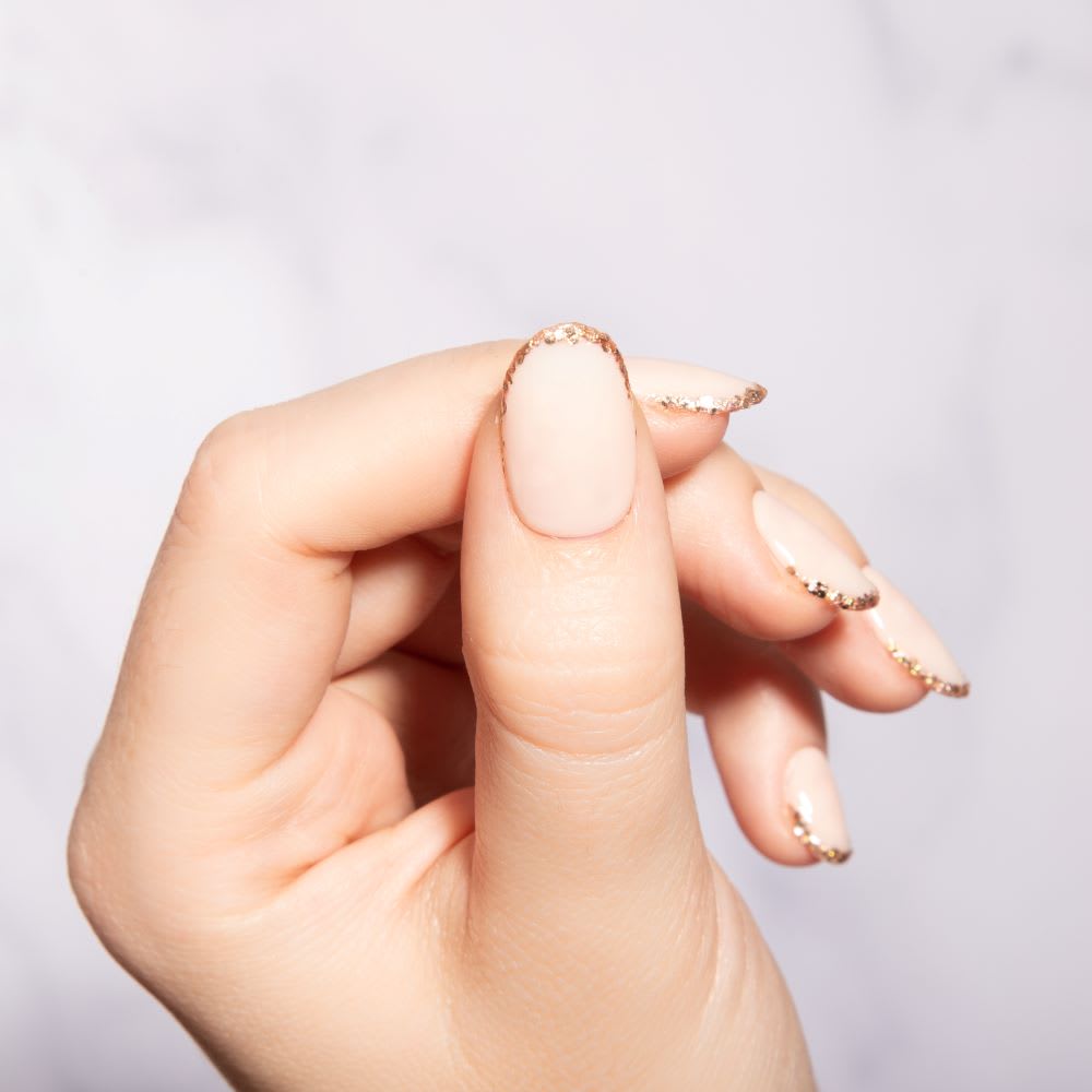 Nude Almond Nails With Gold Glitter Tip Border Nude Almond Nails With Gold Glitter Tip Border — Simple Vintage Nails