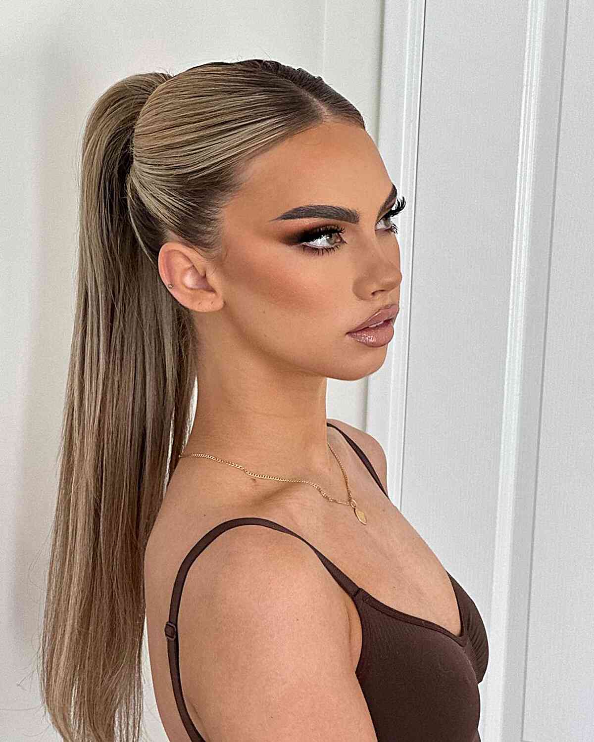 Ash Blonde Ponytail With Light Highlights — Slick Back Ponytail Ideas