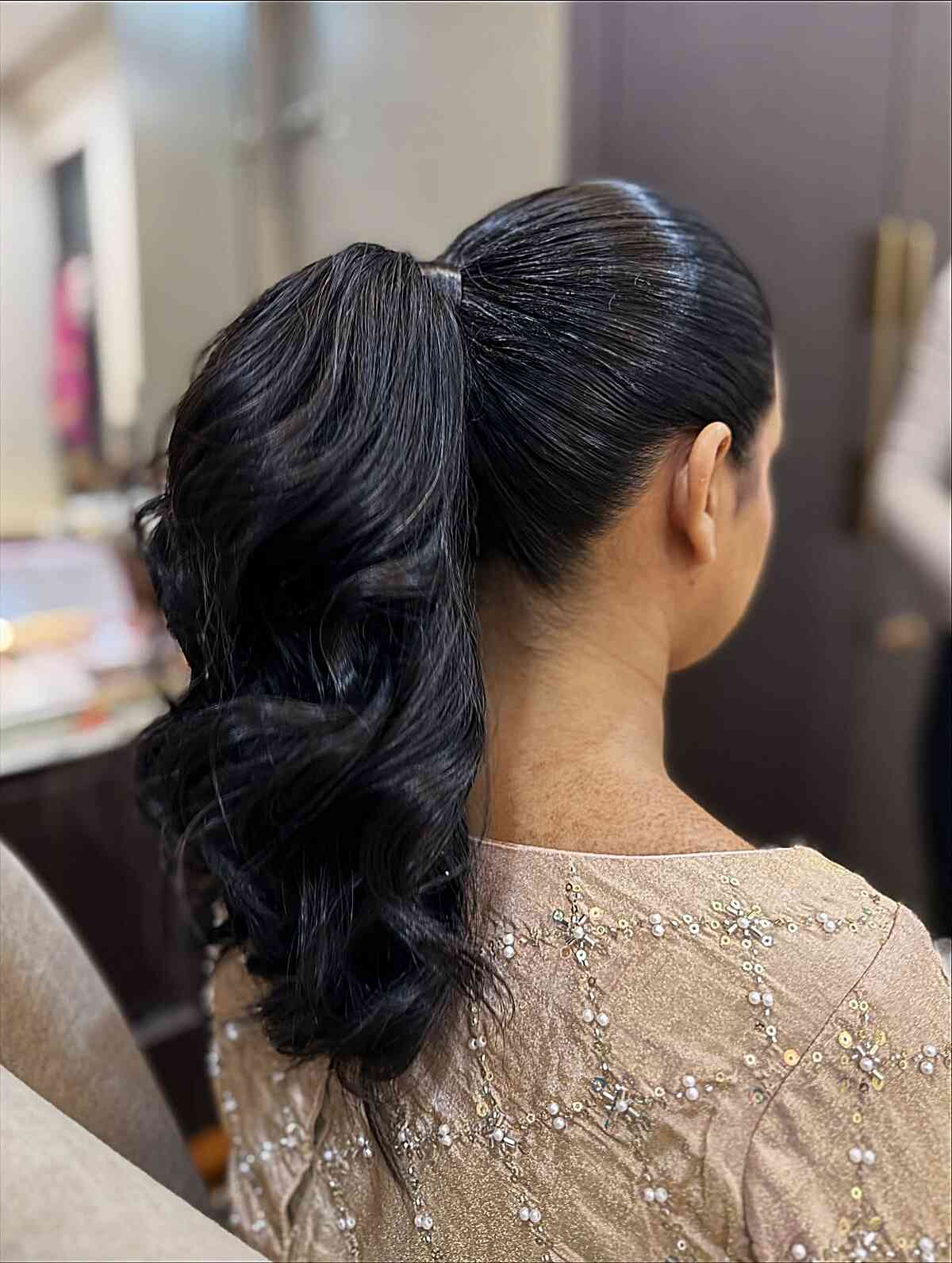 Collarbone Length Voluminous Ponytail With Large Waves — Slick Back Ponytail Ideas