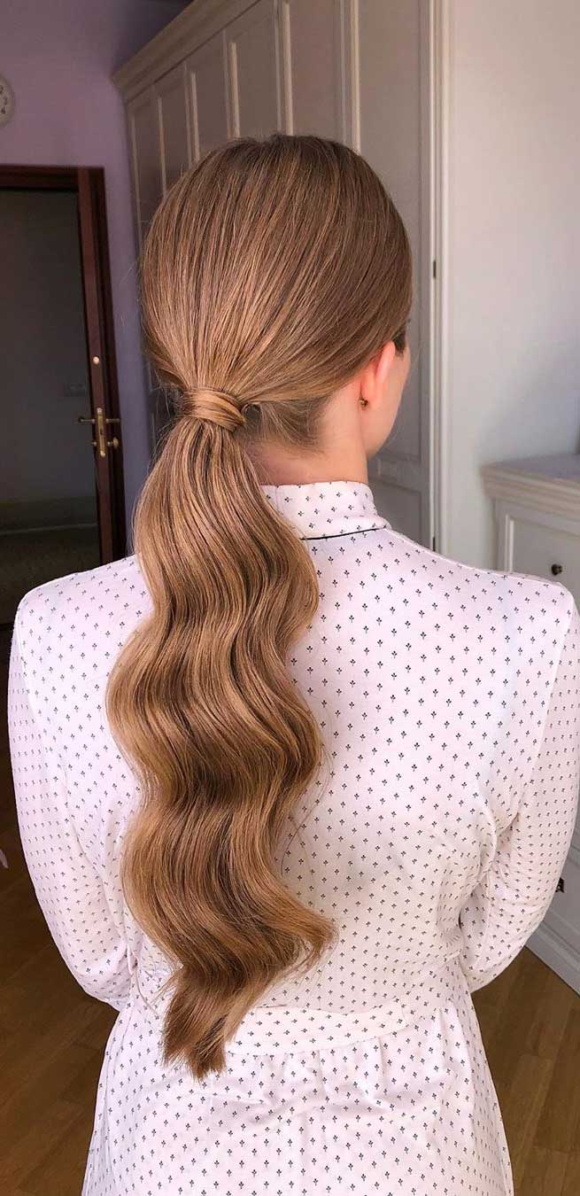 Low Light Brown Ponytail With Voluminous Waves — Slick Back Ponytail Ideas