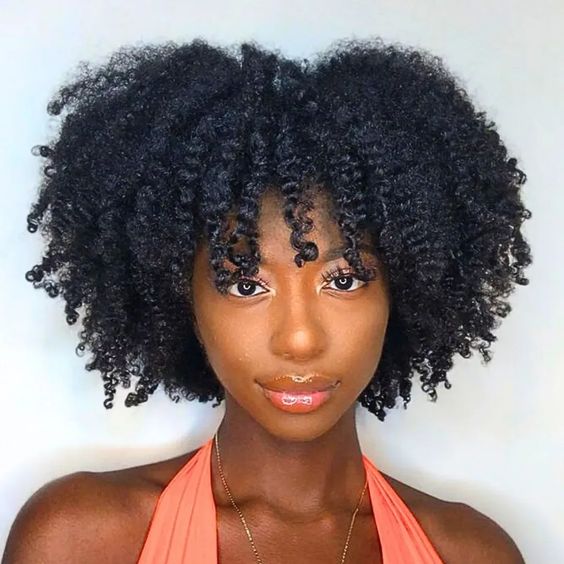 Shoulder Length Voluminous Layered Afro Blowout With A Middle Parting Shoulder Length Voluminous Layered Afro Blowout With A Middle Parting — Trendy 4c Hairstyles