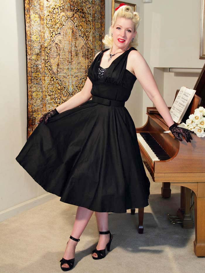 Black Sleeveless Dress with Full Circle Skirt Black Sleeveless Dress with Full Circle Skirt — Trendy 50s Style