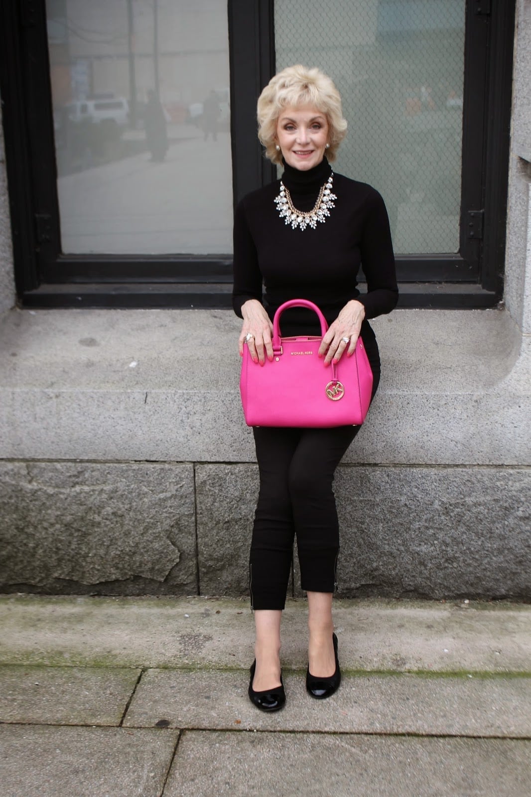 Sleek Black Turtleneck and Trousers with Pink Accent Sleek Black Turtleneck and Trousers with Pink Accent — Trendy 50s Style