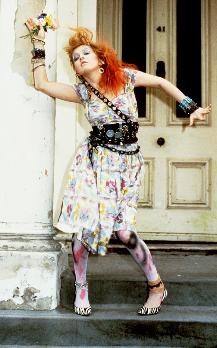Floral Print Dress With Studded Belt and She Wears Bold Makeup — Trendy 80s Outfits