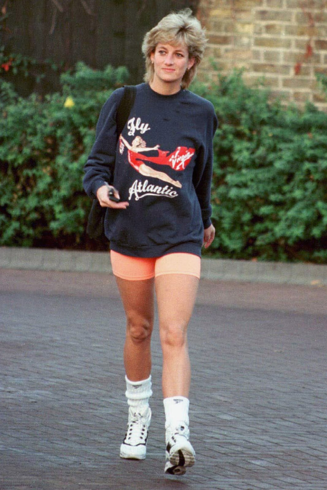 Oversized Graphic Sweatshirt With Athletic Shorts — Trendy 80s Outfits