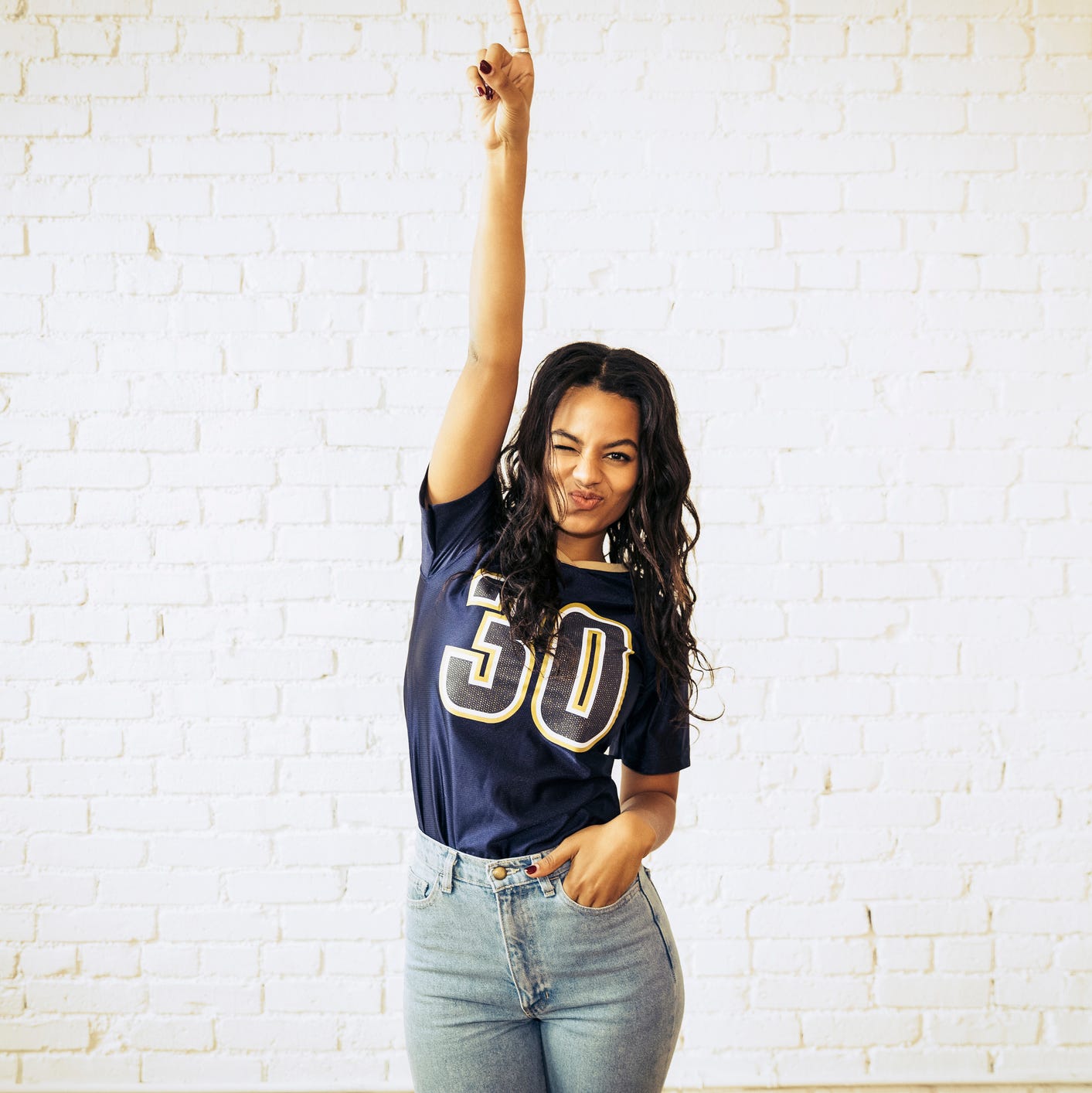 Varsity T-Shirt with High-Waisted Jeans Varsity T-Shirt with High-Waisted Jeans — Trendy 90s Style