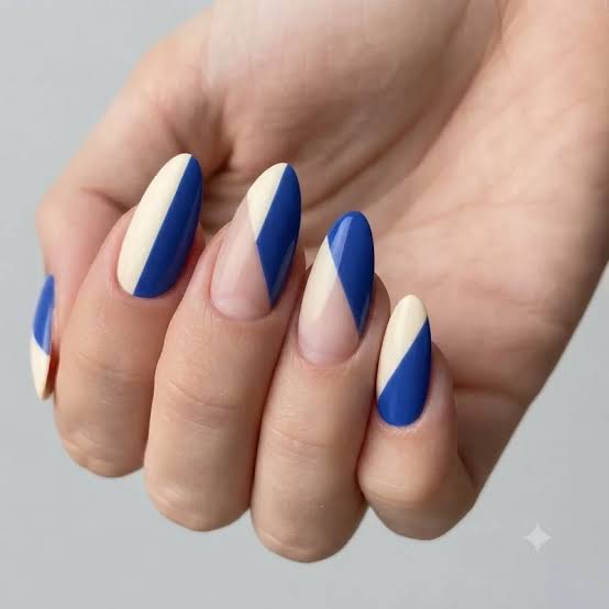 Medium Almond Cream Deep Blue Color Block Nails Medium Almond Cream Deep Blue Color Block Nails — Trendy Abstract Nails