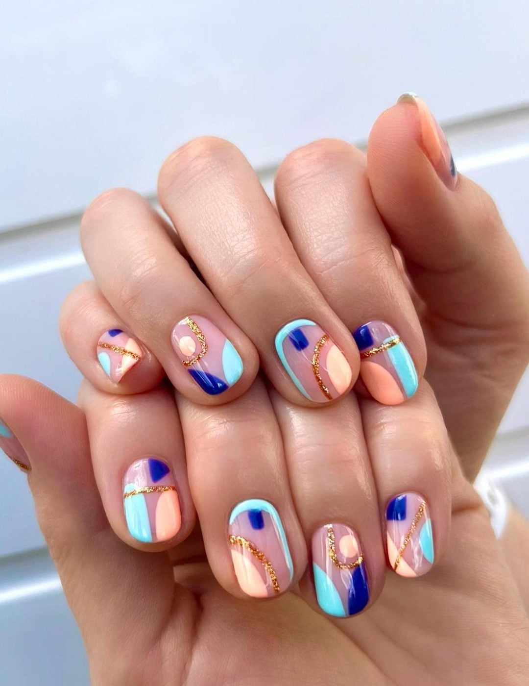 Short Oval Nude Geometric Gold Line Nails Short Oval Nude Geometric Gold Line Nails — Trendy Abstract Nails