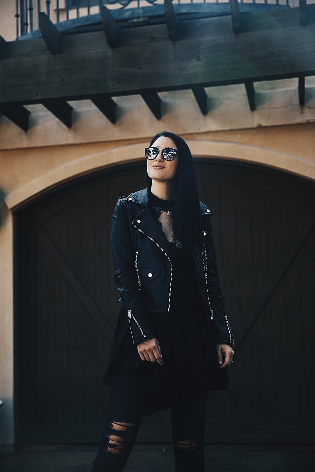 Leather Moto Jacket With Ripped Jeans — Trendy All Black Outfits