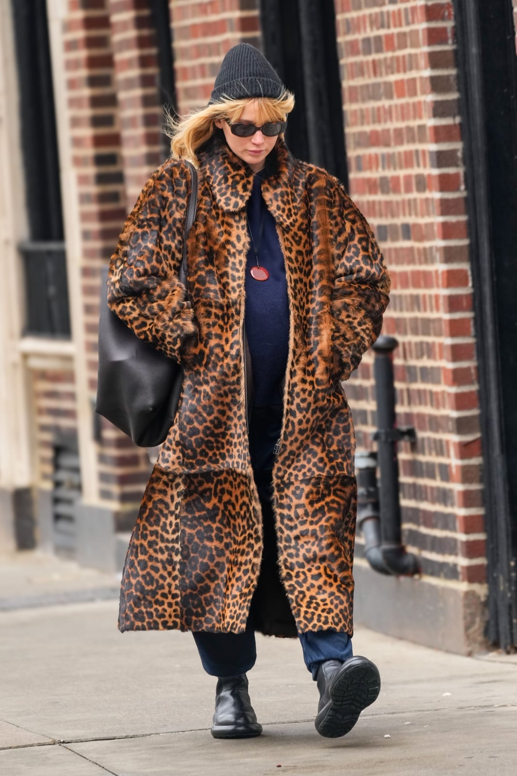 Leopard Print Faux Fur Coat Over Navy Sweater Leopard Print Faux Fur Coat Over Navy Sweater — Trendy Animal Print Outfits