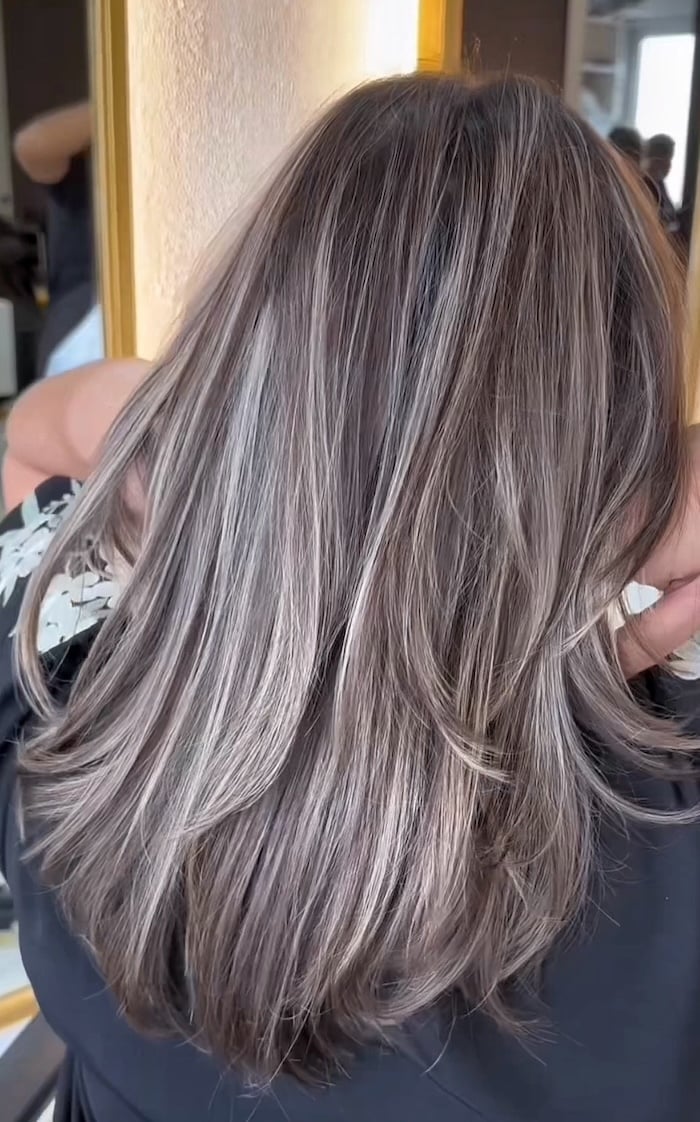 Collarbone Layers With Cool Ash Highlights, Wavy — Trendy Ash Brown Hair