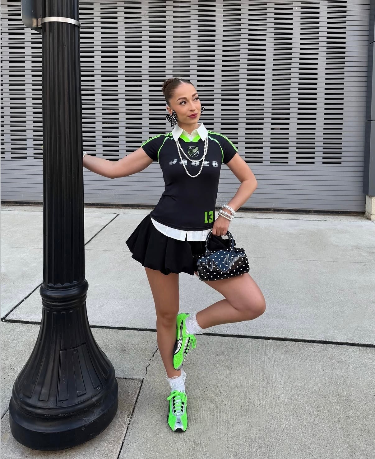 Polo Shirt Over White Shirt with Pleated Mini Skirt and Neon Sneakers — Trendy Athleisure Outfits