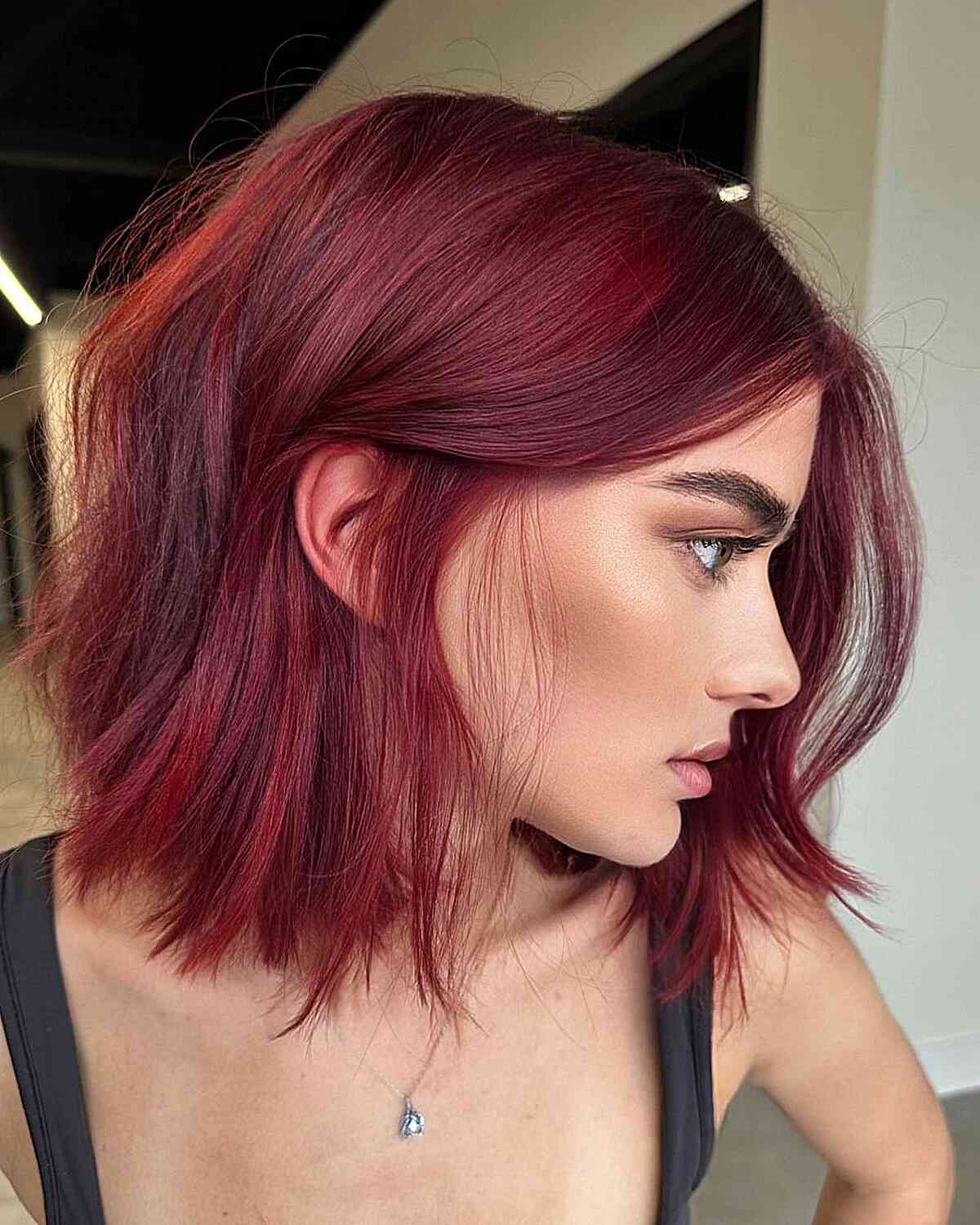 Vibrant Copper Auburn Chin Length Bob With Curtain Bangs Vibrant Copper Auburn Chin Length Bob With Curtain Bangs — Trendy Auburn Hair Color