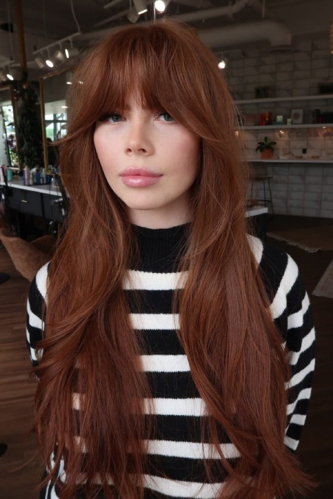 Vibrant Copper Auburn Mid-Back With Curtain Bangs, Office-Safe Version Vibrant Copper Auburn Mid-Back With Curtain Bangs, Office-Safe Version — Trendy Auburn Hair Color