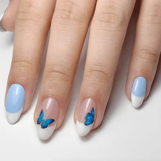White French Blue Butterfly Medium Oval Nails White French Blue Butterfly Medium Oval Nails — Trendy Baby Blue Nails