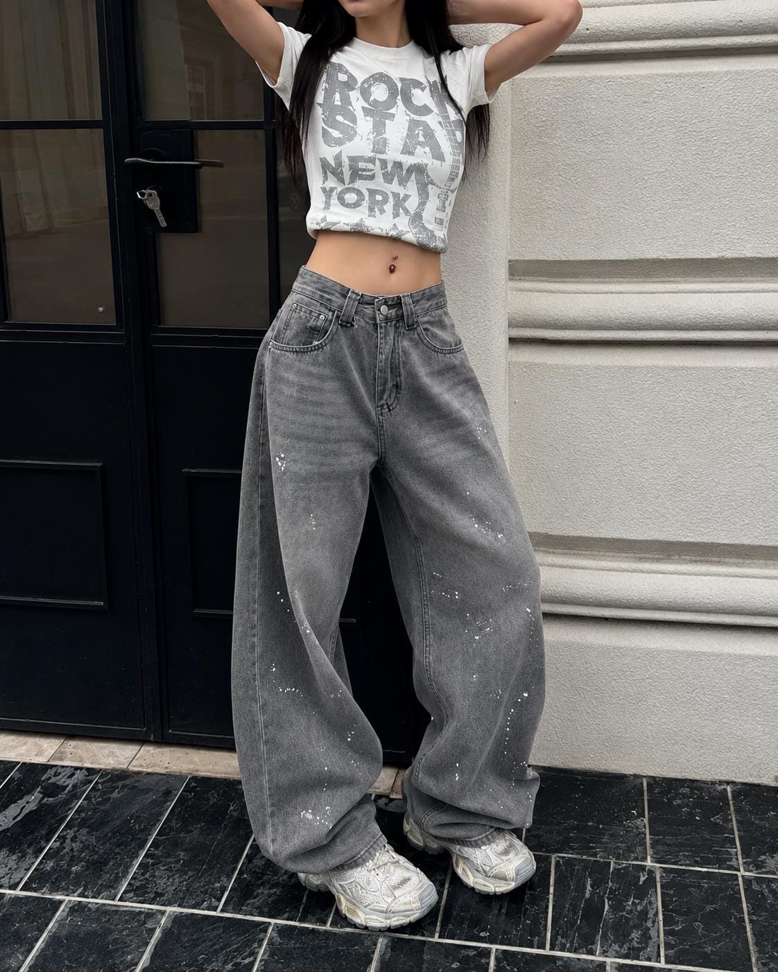 Grey Baggy Jeans With Paint Splatters And Graphic Top — Trendy Baggy Jeans Outfits