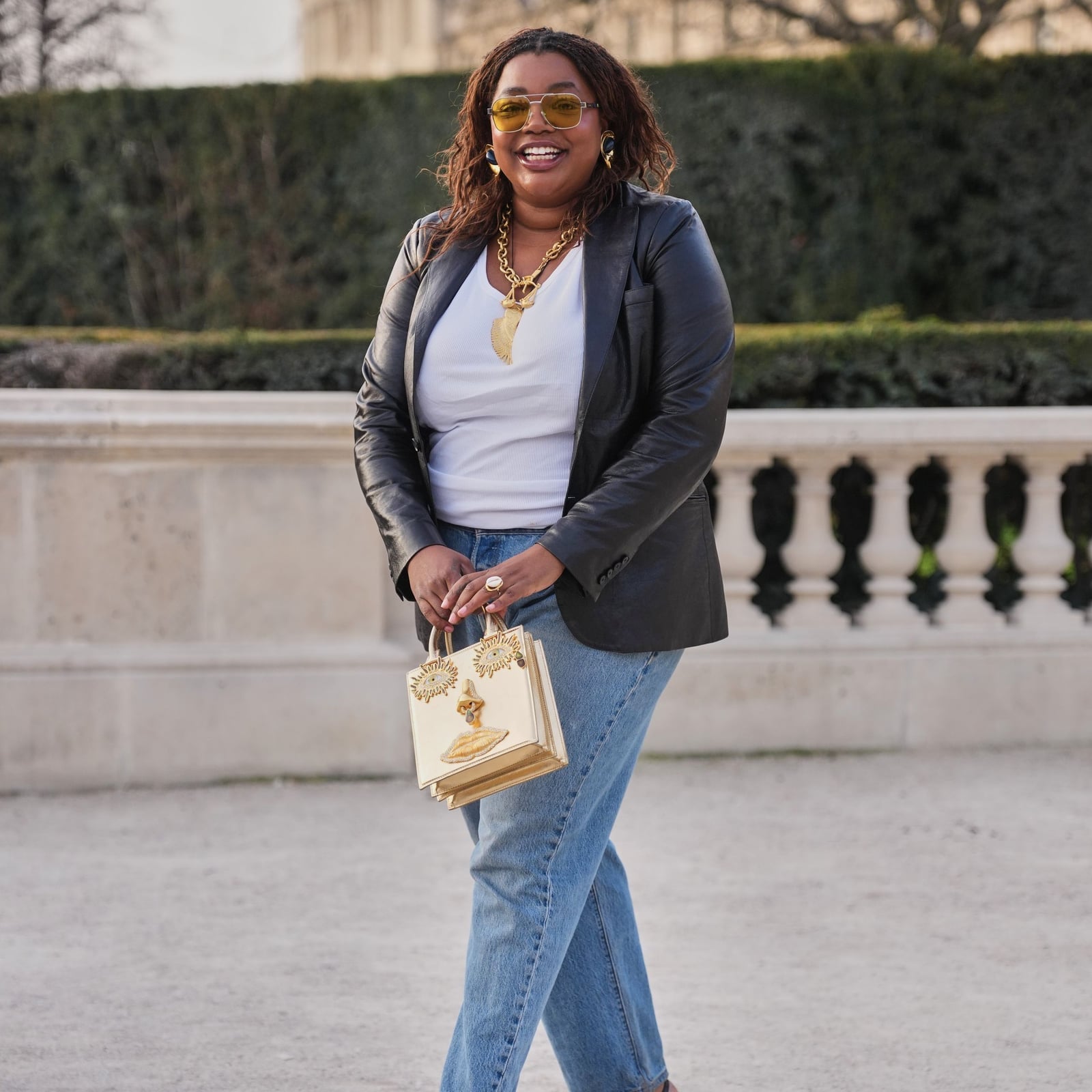Light Wash Baggy Jeans With Leather Blazer And Gold Accessories — Trendy Baggy Jeans Outfits