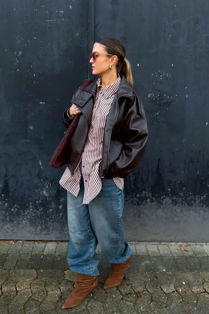 Baggy Light Wash Jeans With Striped Shirt And Oversized, Close-Up Take — Trendy Baggy Jeans Outfits