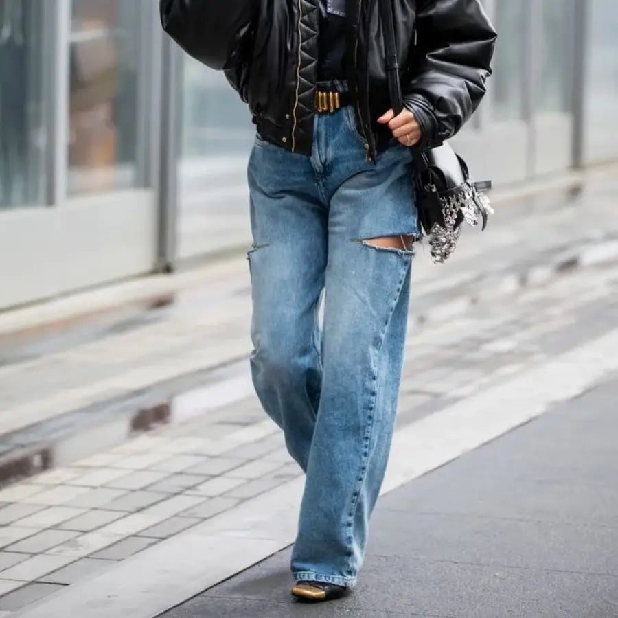 Distressed Baggy Jeans With Ripped Knee And Leather Jacket — Trendy Baggy Jeans Outfits