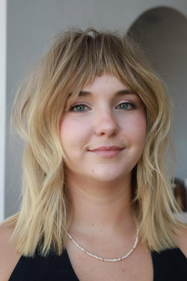 Shoulder Shag With Wispy Fringe Shoulder Shag With Wispy Fringe — Trendy Bangs Style